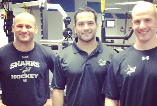 Boston University strength and conditioning coach Anthony Morando (left) poses with Mike Potenza (center), his counterpart from the NHL's San Jose Sharks and Ken Hetzel of the Worcester Sharks.